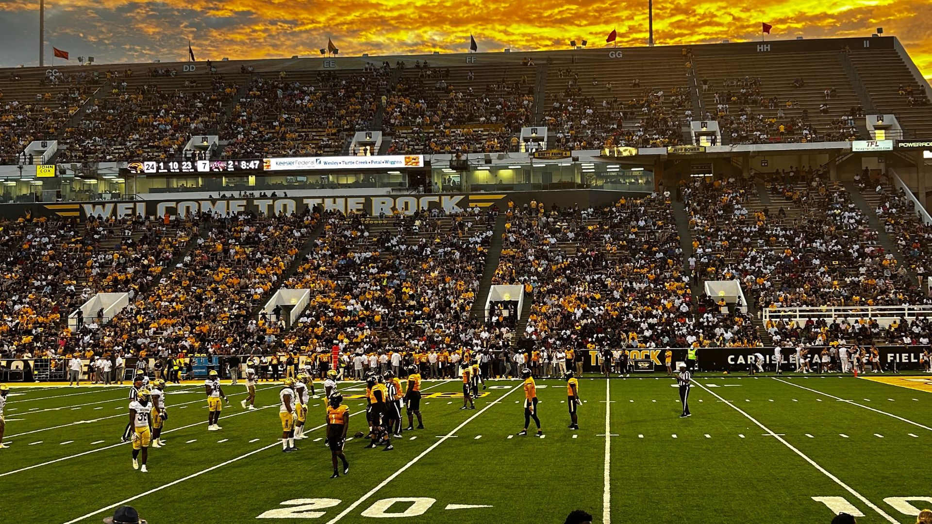 Football stadium sunset